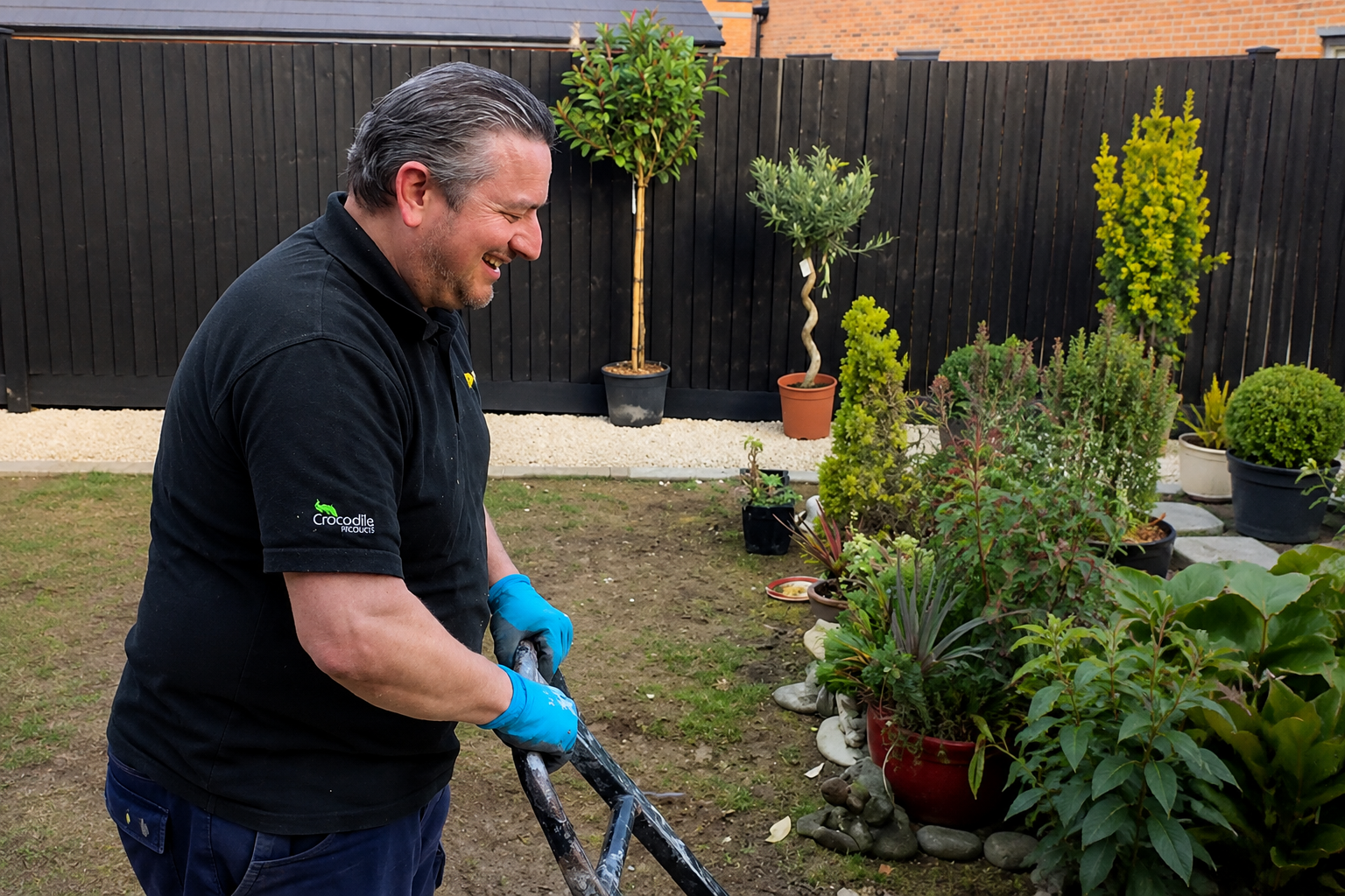 Nat Ciccone working on a garden transformation in Surrey